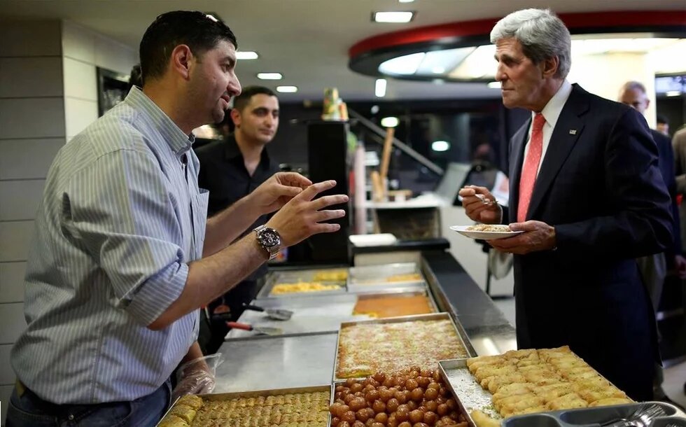 U.S. Secretary of State John Kerry Visits Samer's Sweets Shop in the West Bank city of Al-bireh on May 23, 2013